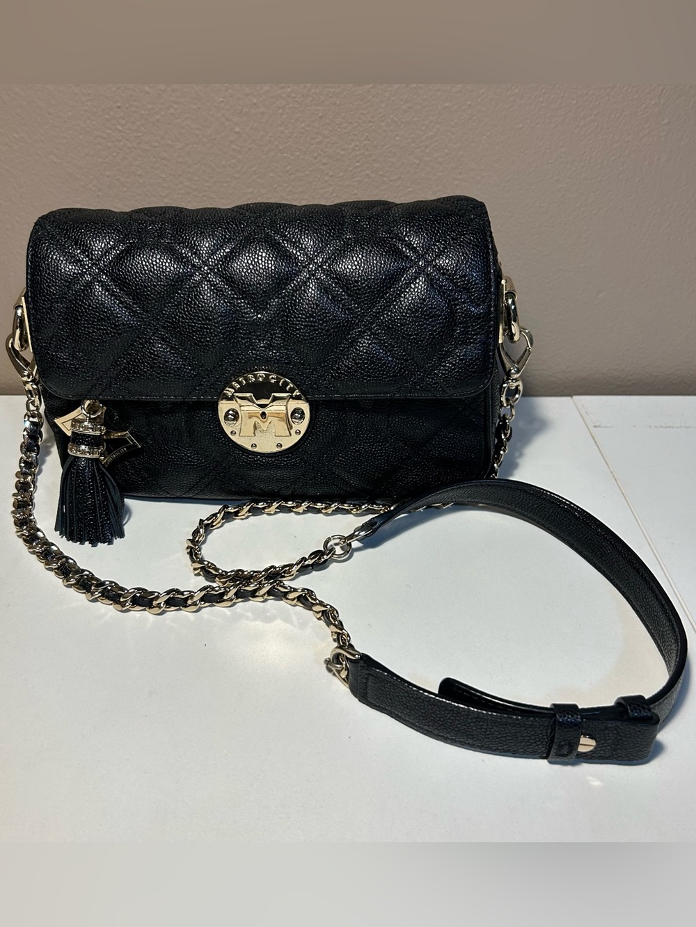 Metrocity Black Quilted Leather Shoulder Bag Gold Chain Strap Tassel Logo Charm